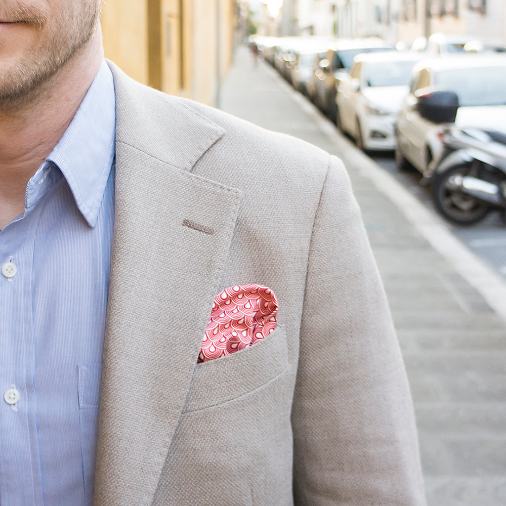 Elegant FatCloth Musashi Red pocket square in neutral sand blazer's pocket