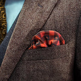 Lumberjack patterned FatCloth Stig Red puff fold in a brown herringbone tweed pocket