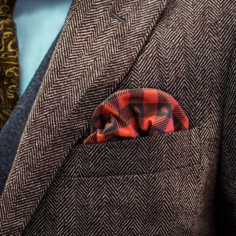 Lumberjack patterned FatCloth Stig Red puff fold in a brown herringbone tweed pocket